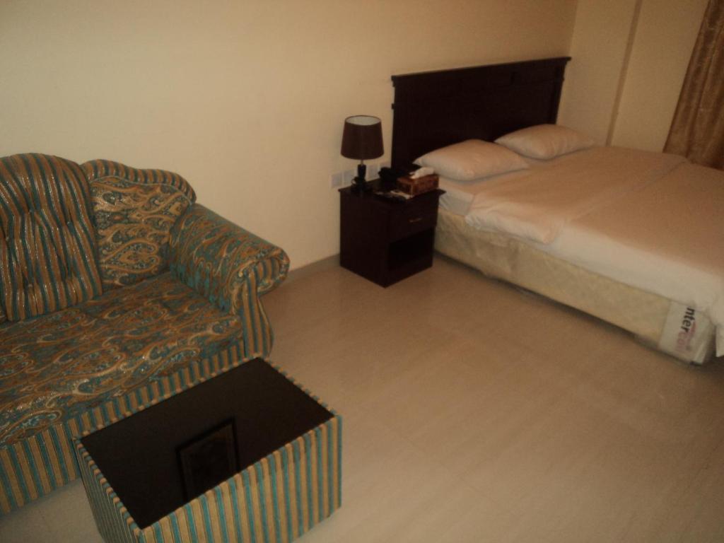 Taj Al Arab Hotel Al Buraimi Quarto foto