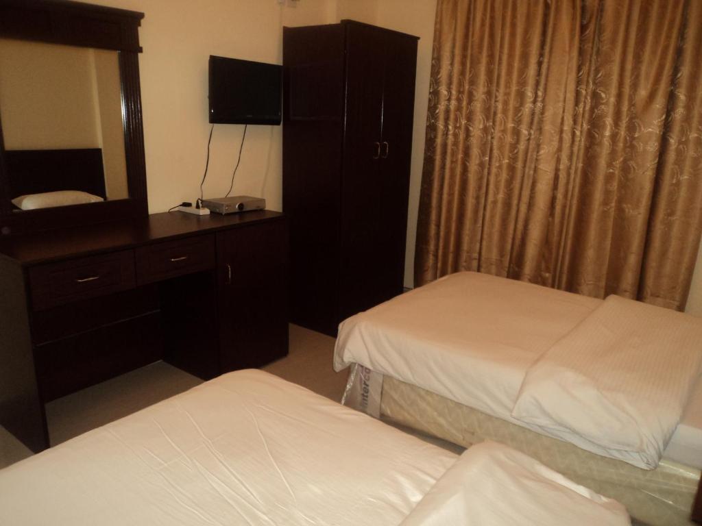 Taj Al Arab Hotel Al Buraimi Quarto foto
